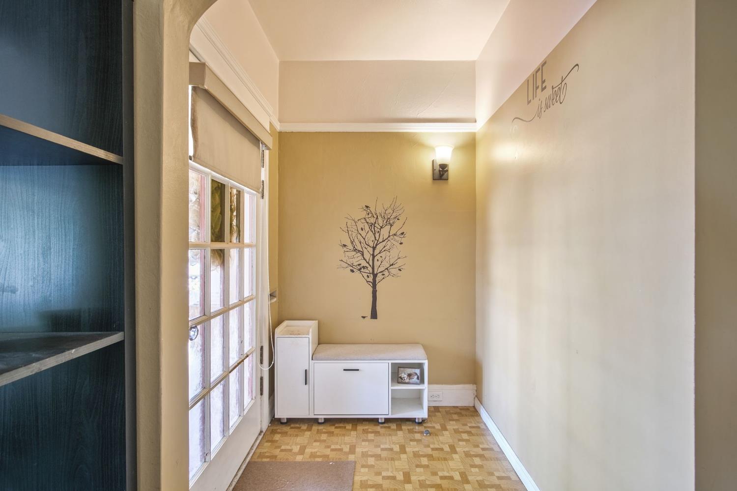 930 West Harding Way Stockton, CA 95203 - Photo 5 of 22 a bathroom with a bathtub and a window