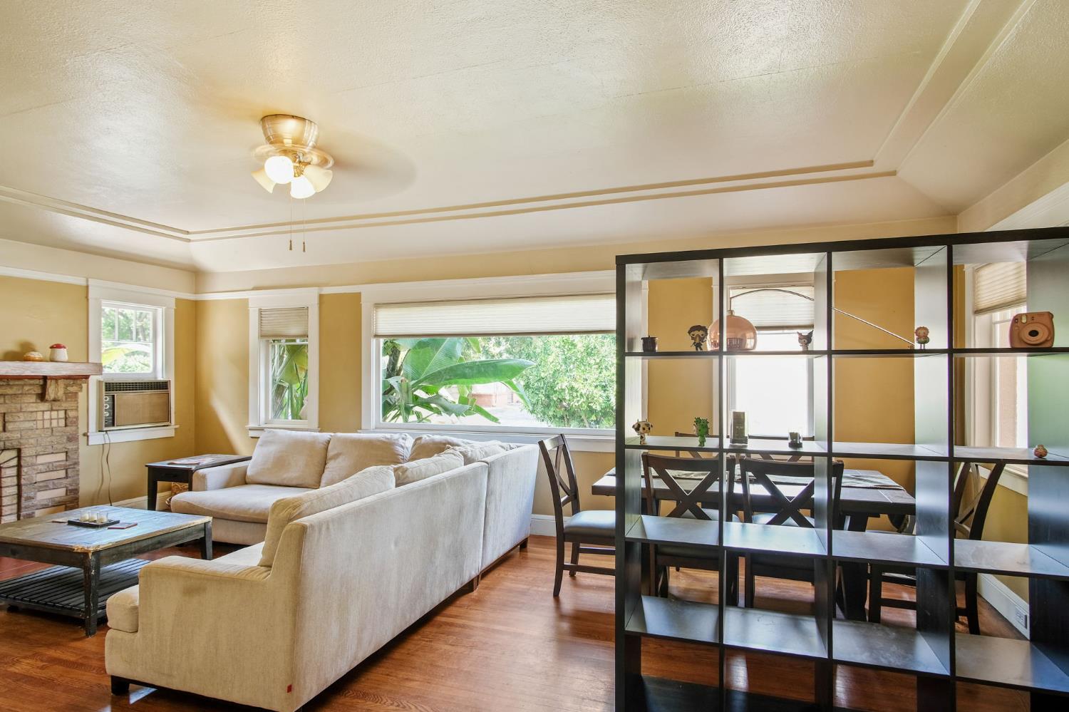 930 West Harding Way Stockton, CA 95203 - Photo 7 of 22 a living room with furniture and a large window