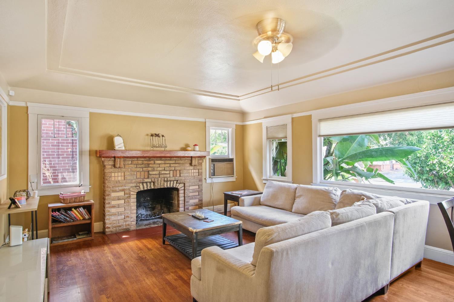 930 West Harding Way Stockton, CA 95203 - Photo 8 of 22 a living room with furniture fireplace and a large window