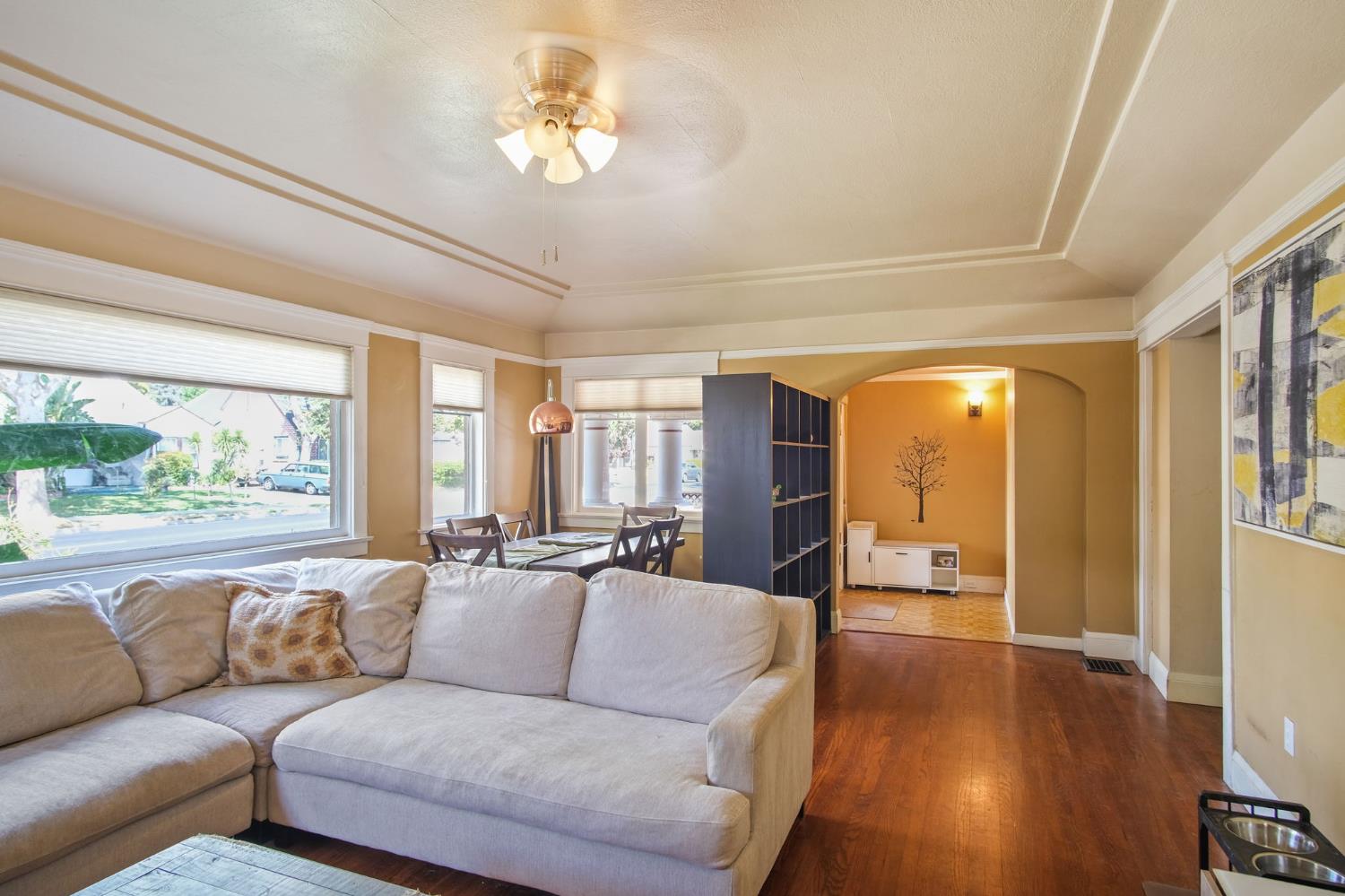 930 West Harding Way Stockton, CA 95203 - Photo 9 of 22 a living room with furniture and a large window