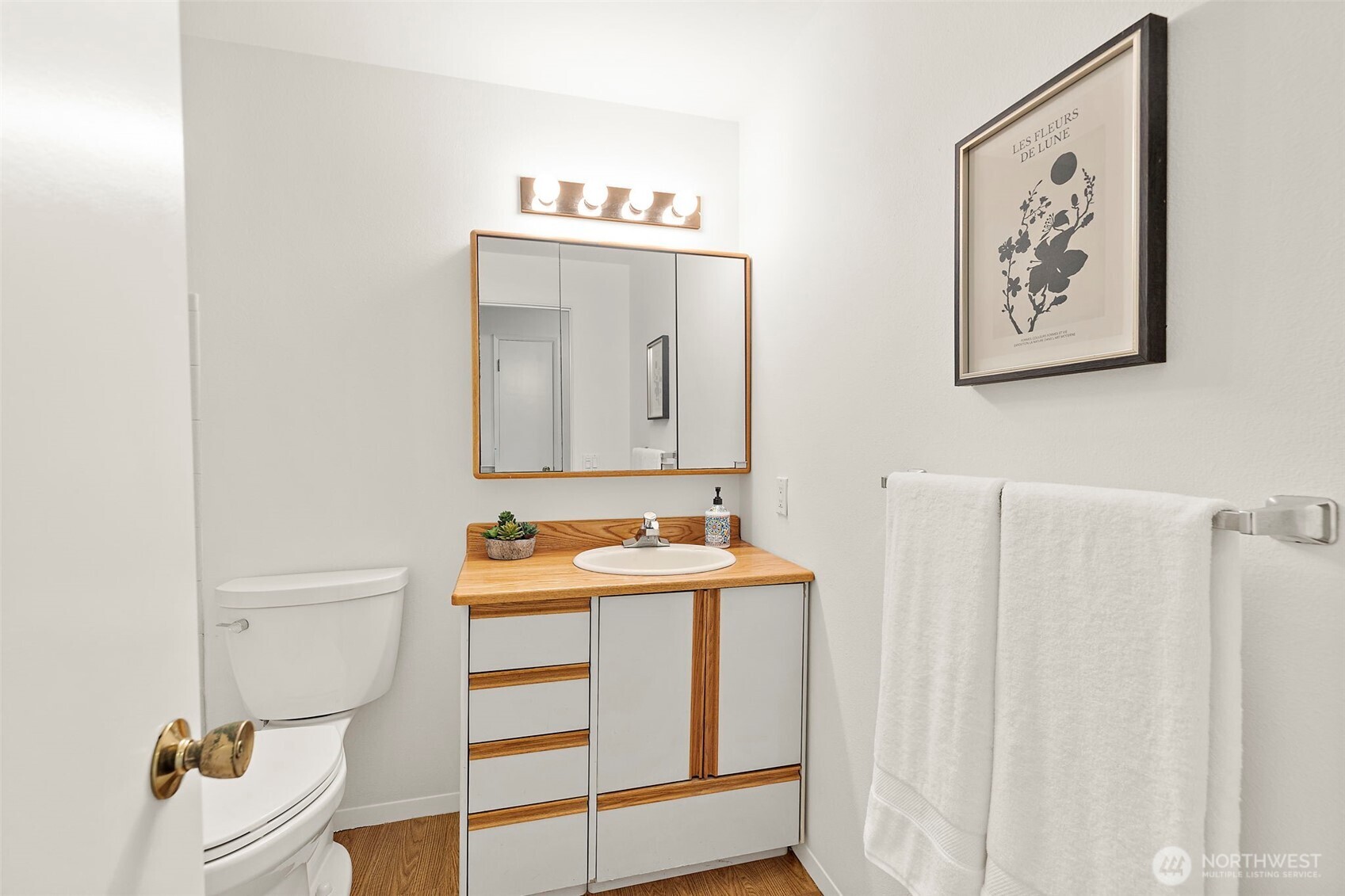2009 Dayton Drive Southeast Renton, WA 98055 - Photo 10 of 19 a bathroom with a sink and a mirror