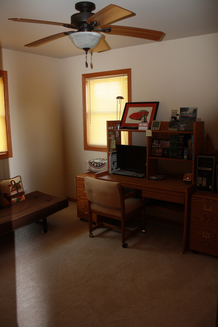 911.41 Melugins Grove Road Compton, IL 61318 - Photo 14 of 25 a room with furniture and window