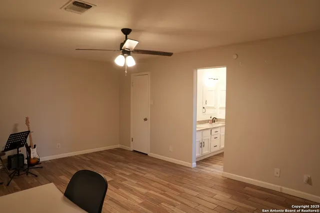 a view of a livingroom with a workspace