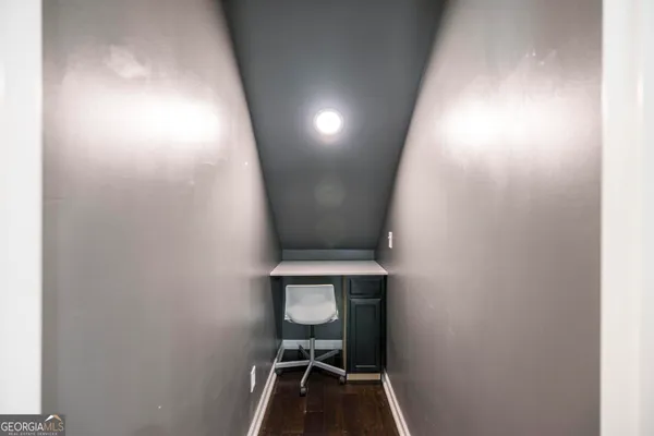 a view of entryway with wooden floor