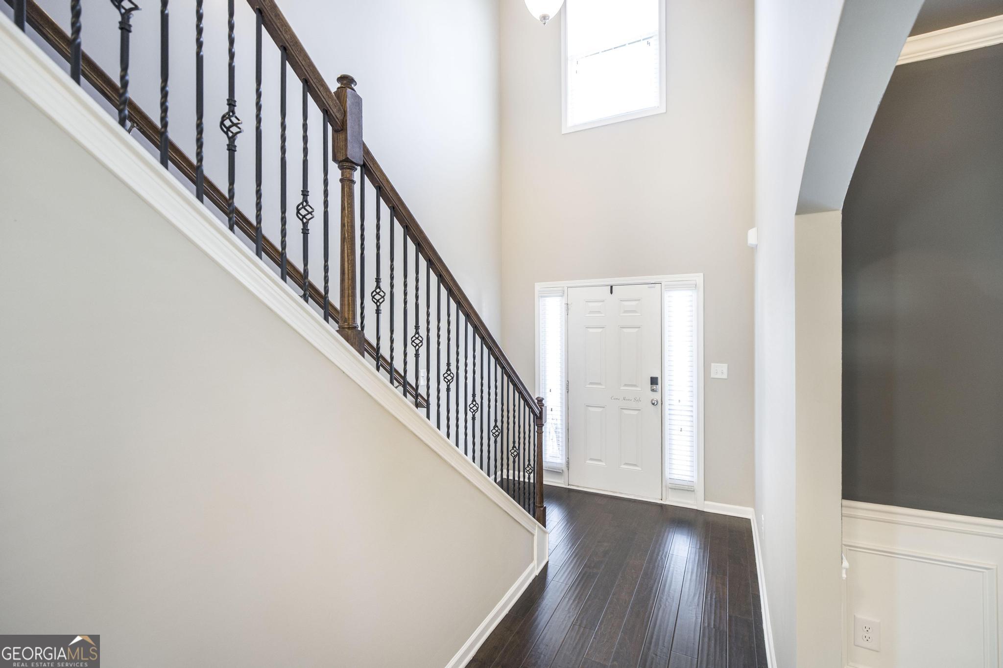 104 Goldenrod Trail Perry, GA 31069 - Photo 6 of 35 a view of a hallway with wooden floor and entryway