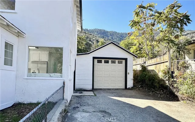 a house view with a outdoor space