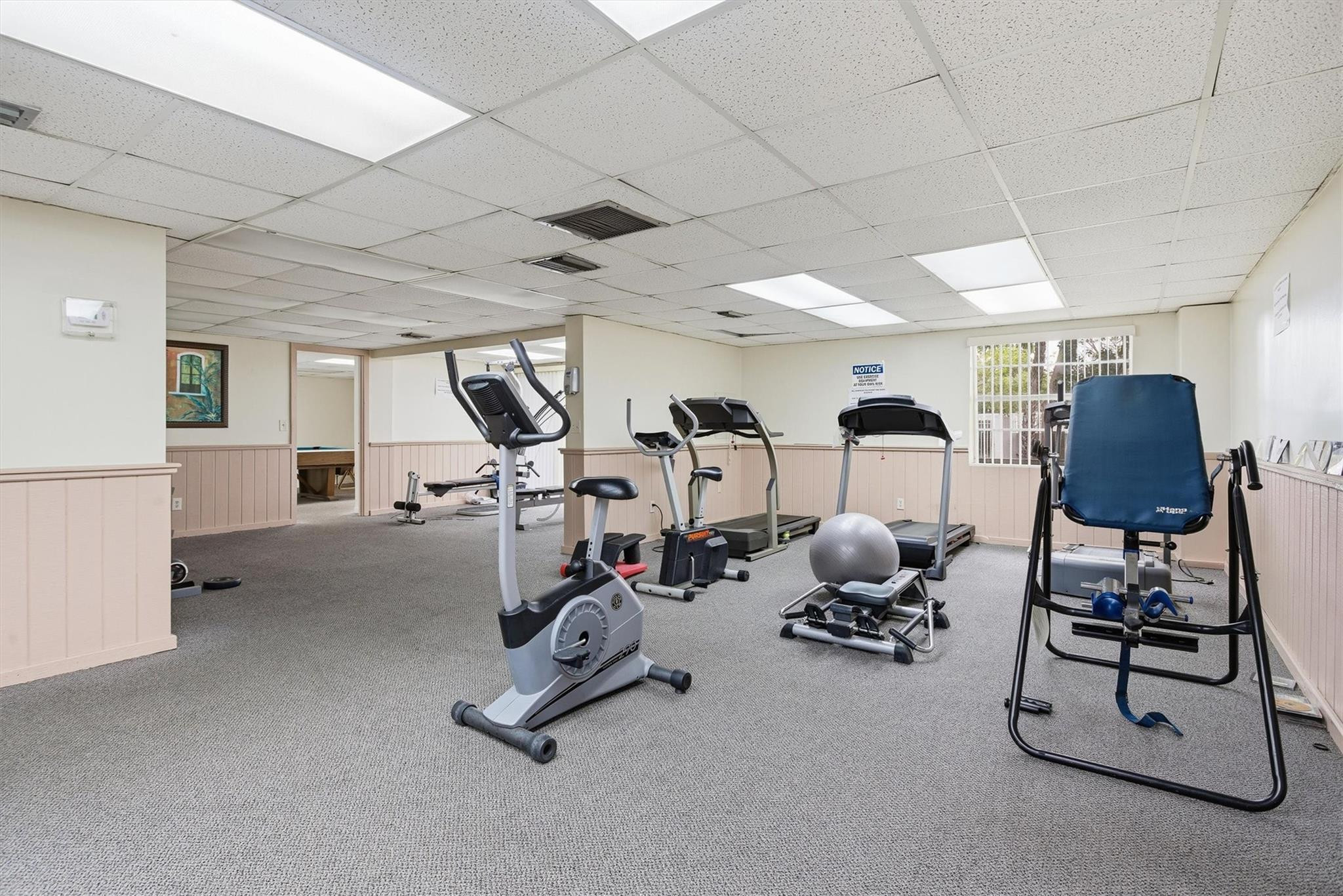 3910 Inverrary Boulevard, Unit 708B Lauderhill, FL 33319 - Photo 34 of 58 a view of a room with gym equipment