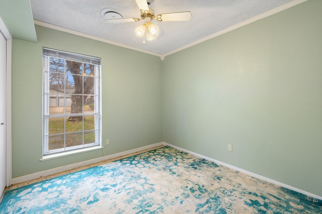 2204 Smith Avenue Taylor, TX 76574 - Photo 29 of 40 Bedroom One. All bedrooms have good closet storage.