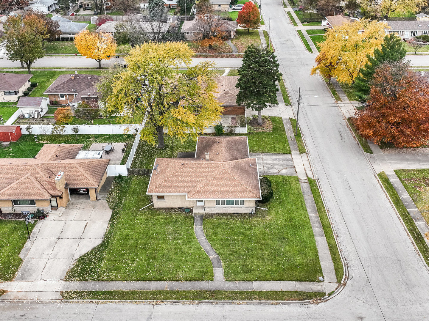 913 Westminster Road Joliet, IL 60435 - Photo 22 of 24 a view of backyard with seating area and trees