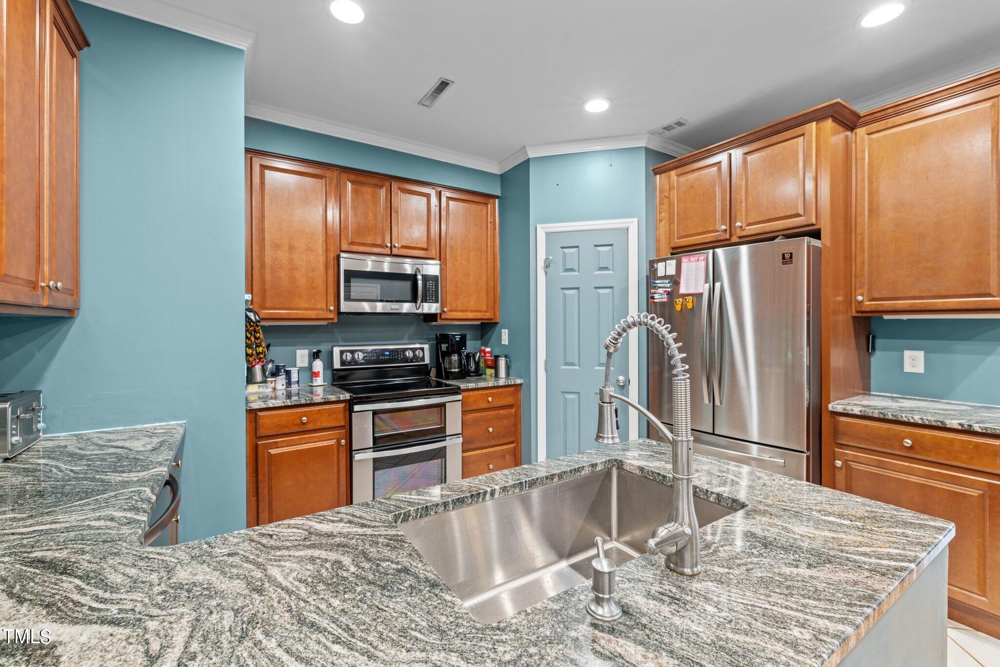 6531 New Market Way Raleigh, NC 27615 - Photo 6 of 27 kitchen