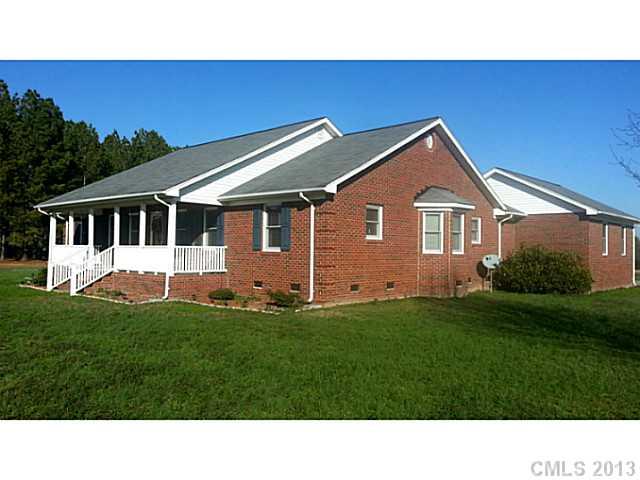 1344 Bowers Road Peachland, NC 28133 - Photo 1 of 15 a black and white photo of a house