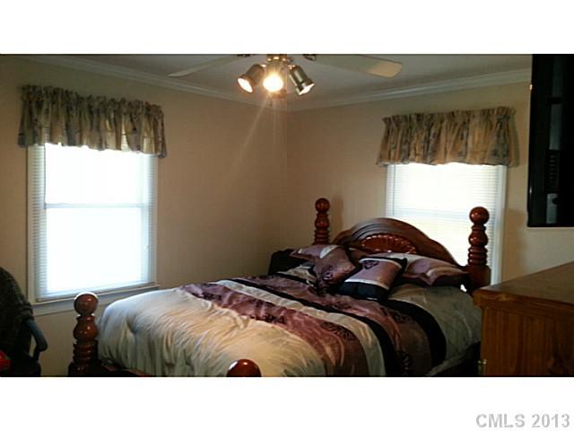 1344 Bowers Road Peachland, NC 28133 - Photo 10 of 15 a bedroom with a bed and a window