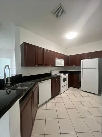 $385,000 | 7200 Northwest 177th Street, Unit 2067, Hialeah, FL 33015