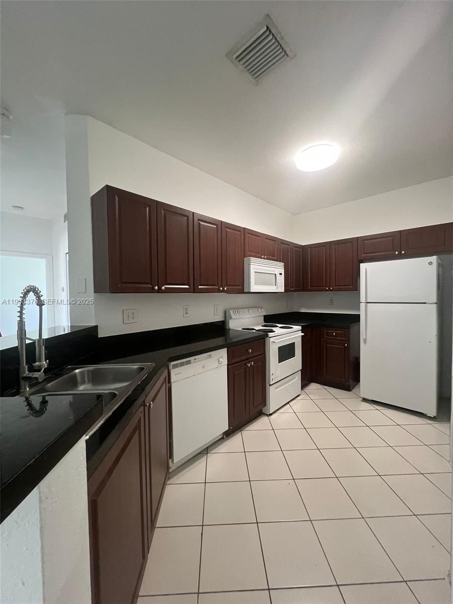 7200 Northwest 177th Street, Unit 2067 Hialeah, FL 33015 - Photo 1 of 10