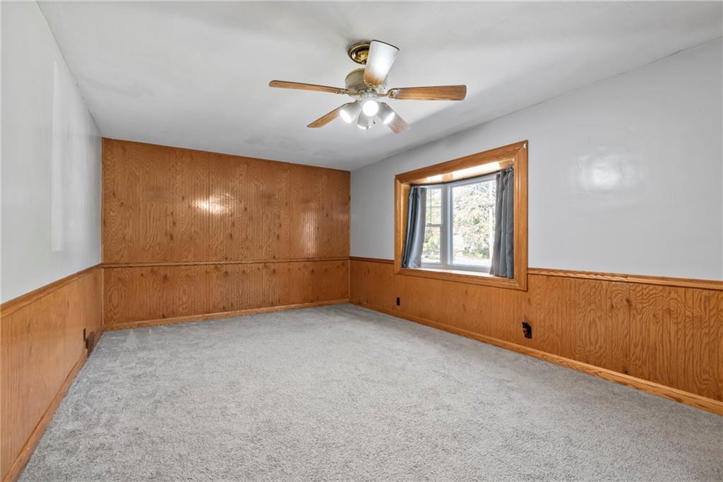 197 Douglass Road Beaver Falls, PA 15010 - Photo 11 of 33 wooden floor in an empty room with a window