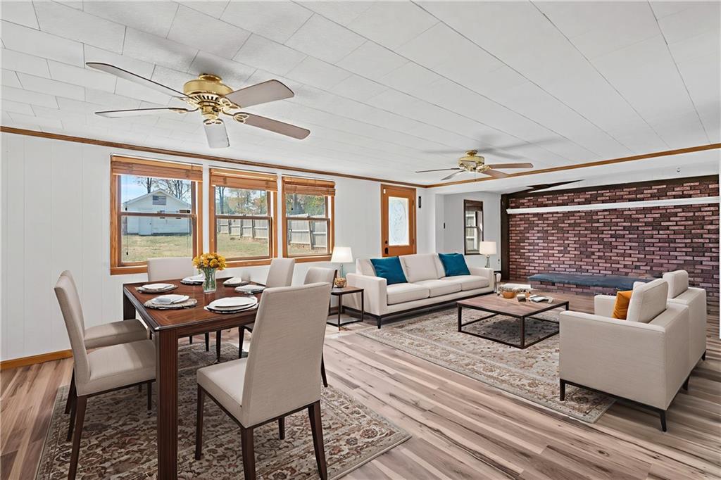 197 Douglass Road Beaver Falls, PA 15010 - Photo 19 of 33 a living room with furniture and a floor to ceiling window