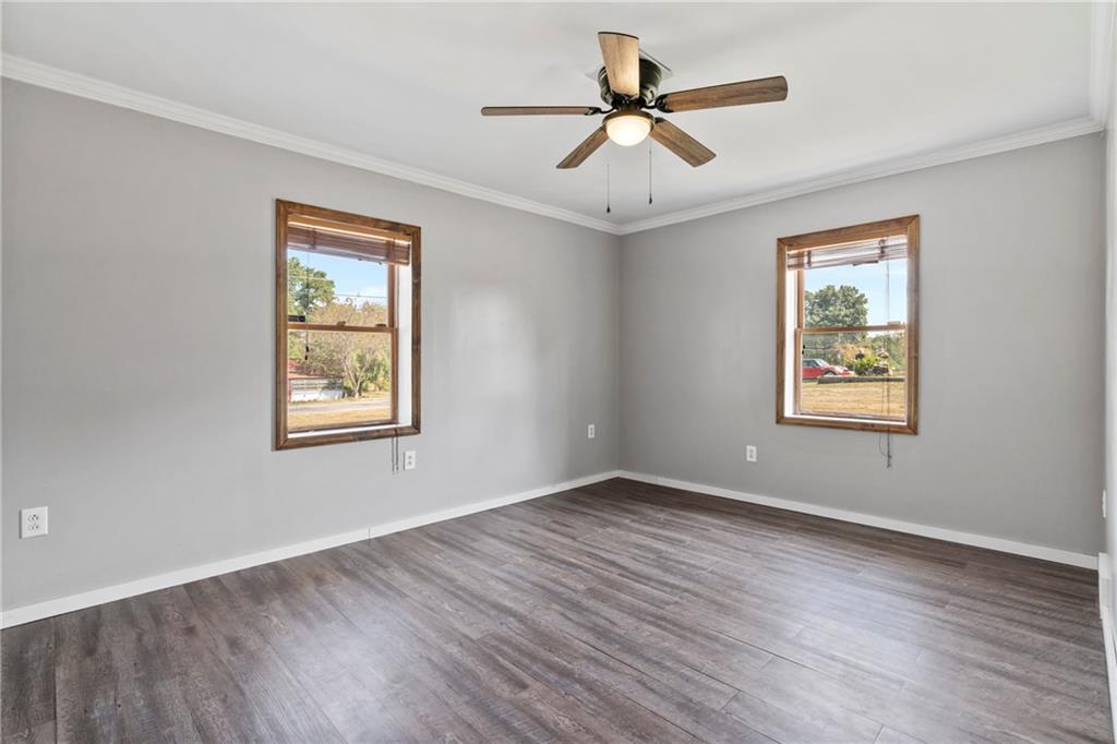 197 Douglass Road Beaver Falls, PA 15010 - Photo 23 of 33 a view of a big room with wooden floor and windows
