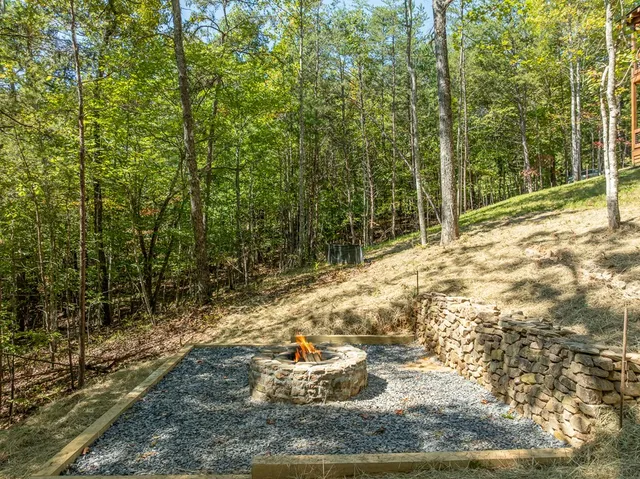 a front view of a building with a garden