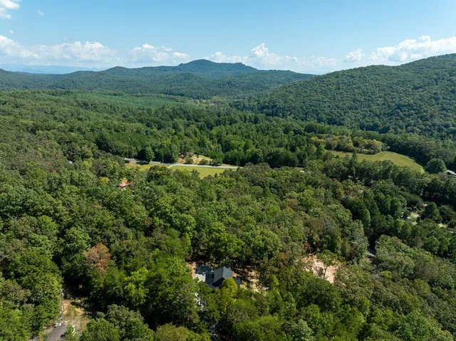 a view of swimming pool with chairs