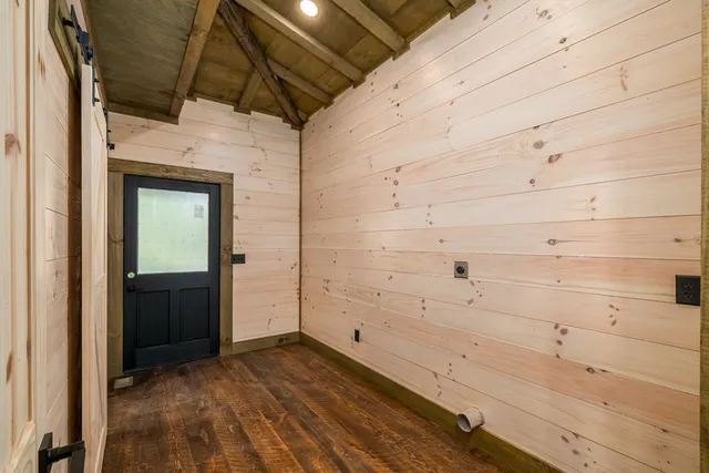 a bathroom with a sink a toilet and vanity