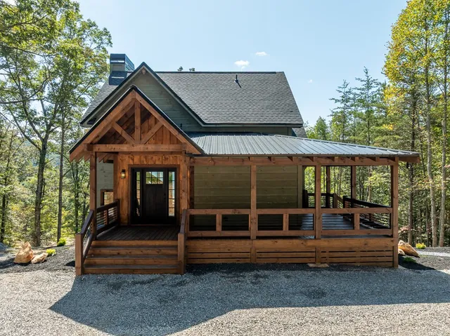a view of a two chairs in the patio