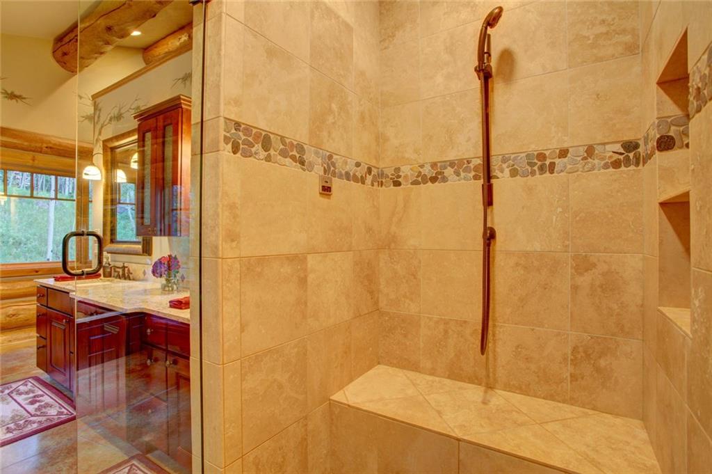 279 Two Cabins Drive Silverthorne, CO 80498 - Photo 11 of 30 a bathroom with a sink and a shower