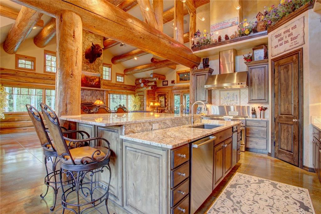 279 Two Cabins Drive Silverthorne, CO 80498 - Photo 19 of 30 a view of a dinning table and chairs in the patio