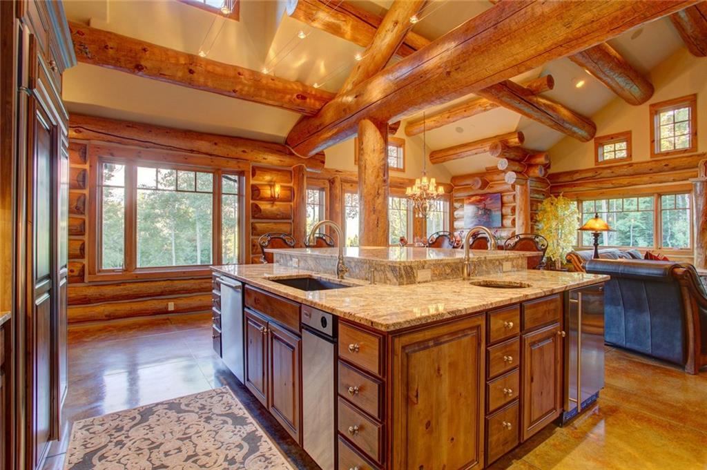 279 Two Cabins Drive Silverthorne, CO 80498 - Photo 20 of 30 a kitchen with a stove and a sink
