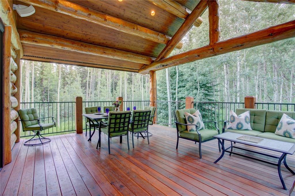 279 Two Cabins Drive Silverthorne, CO 80498 - Photo 22 of 30 a deck view with a seating space