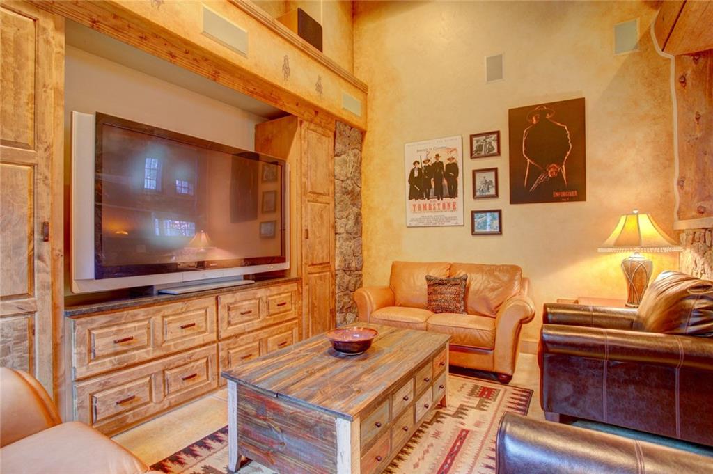 279 Two Cabins Drive Silverthorne, CO 80498 - Photo 29 of 30 a living room with furniture and a flat screen tv