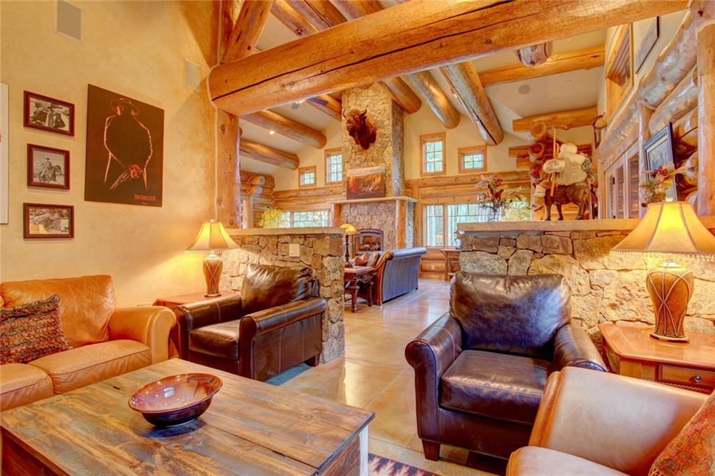 279 Two Cabins Drive Silverthorne, CO 80498 - Photo 30 of 30 a living room with furniture and a large window