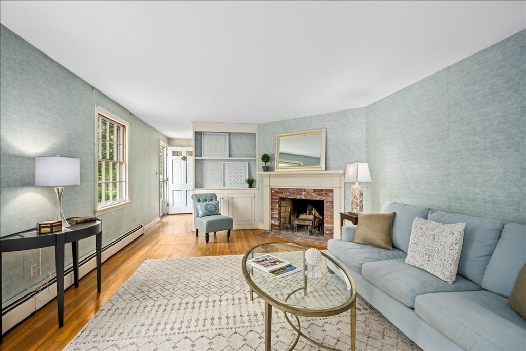 30 Cross Street Shrewsbury, MA 01545 - Photo 13 of 41 a living room with furniture and a fireplace
