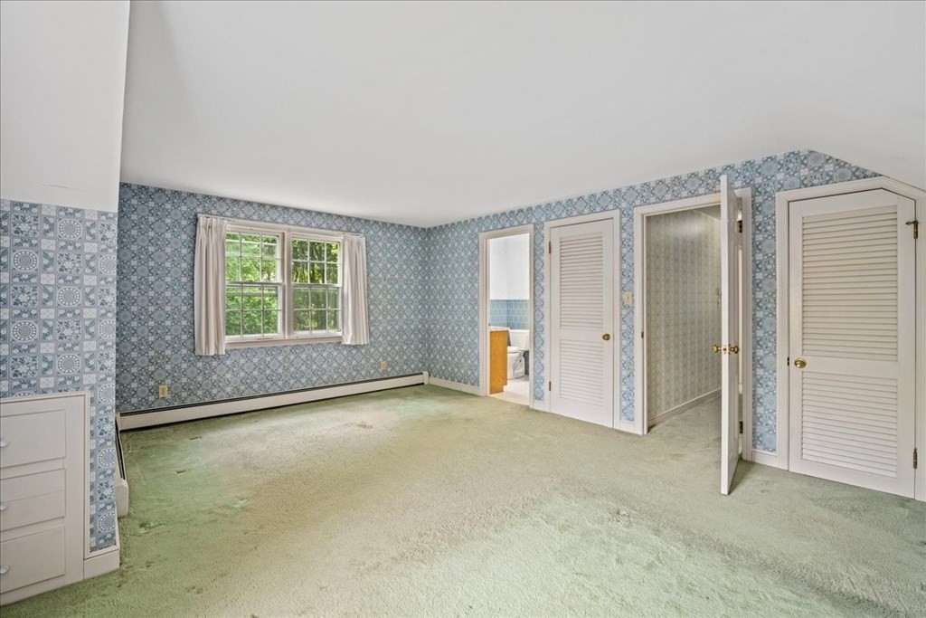 30 Cross Street Shrewsbury, MA 01545 - Photo 19 of 41 an empty room with windows and closet