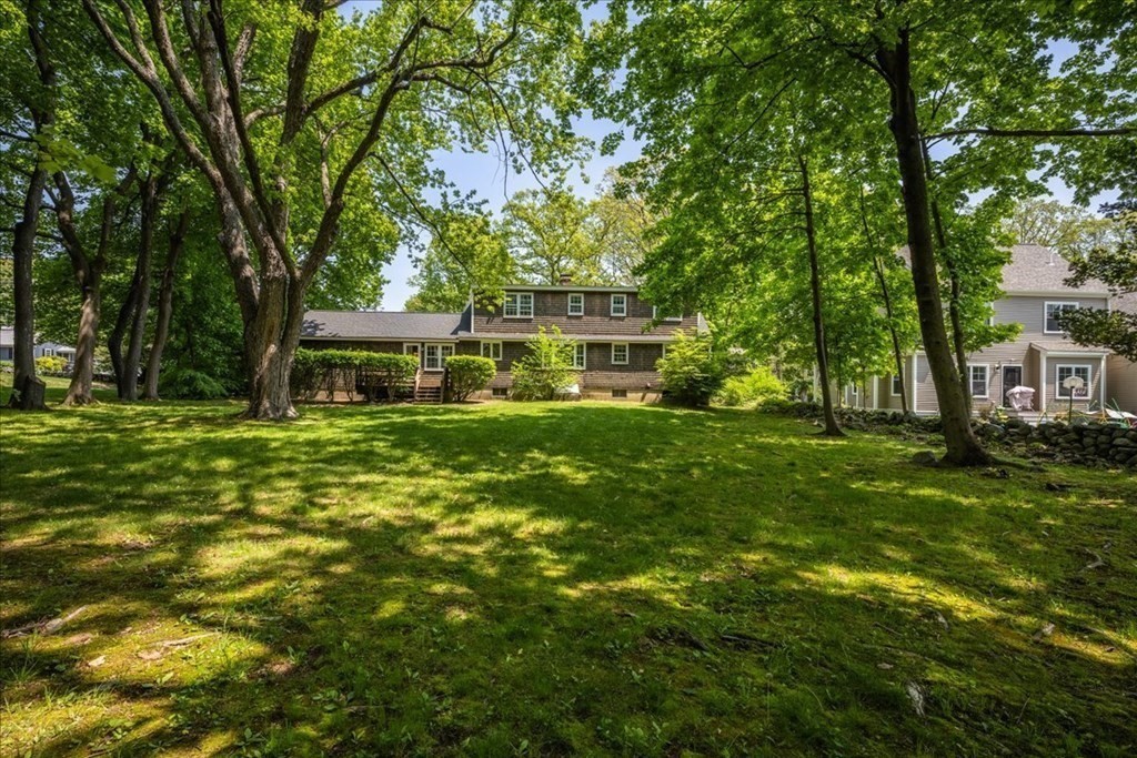 30 Cross Street Shrewsbury, MA 01545 - Photo 3 of 41 a front view of a house with a yard