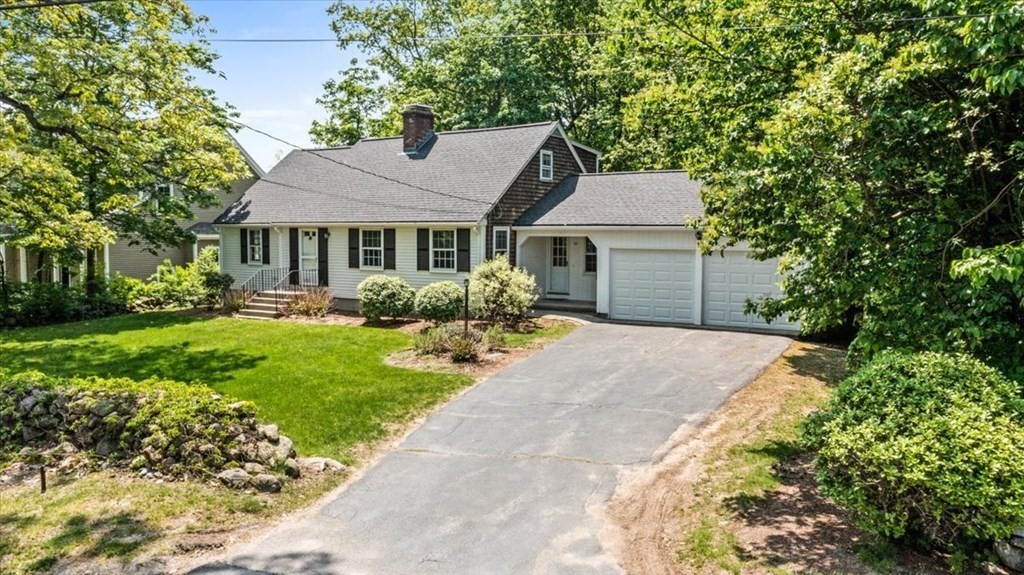 30 Cross Street Shrewsbury, MA 01545 - Photo 35 of 41 a front view of a house with a garden