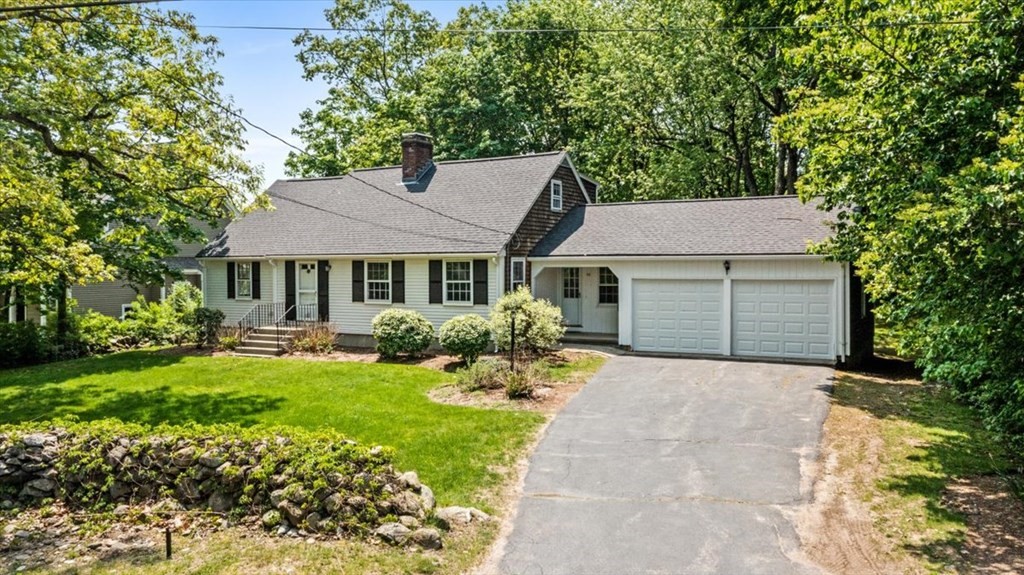 30 Cross Street Shrewsbury, MA 01545 - Photo 40 of 41 a front view of a house with a yard and porch