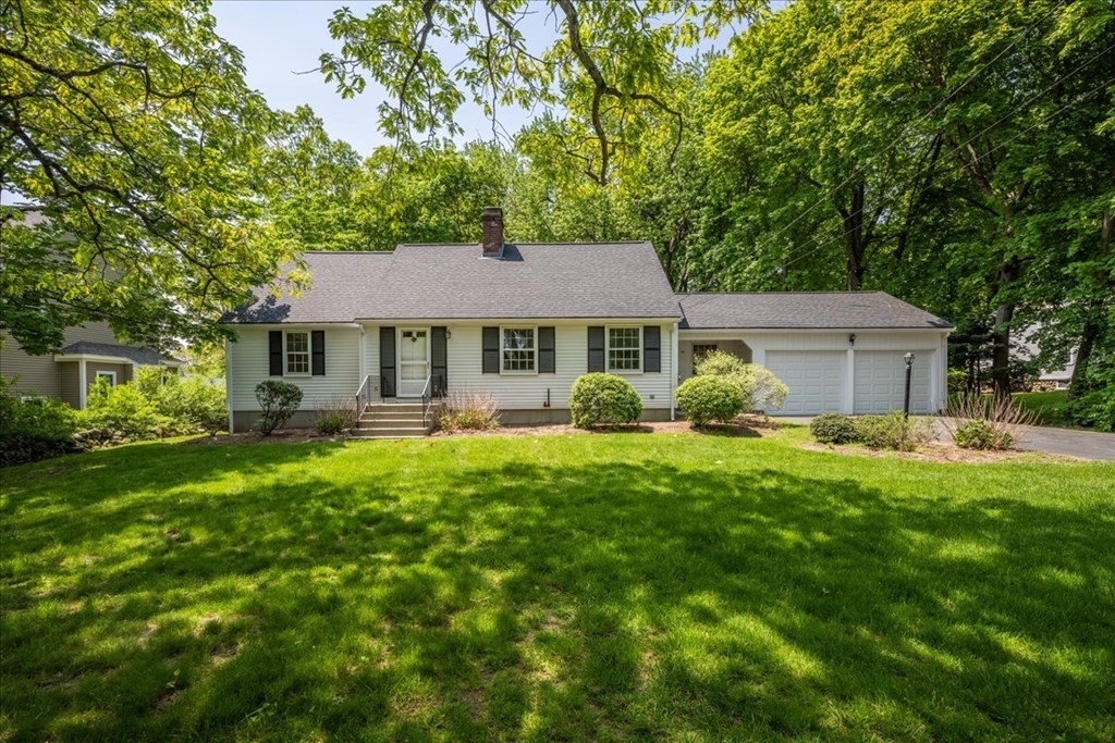 30 Cross Street Shrewsbury, MA 01545 - Photo 41 of 41 a front view of a house with a garden
