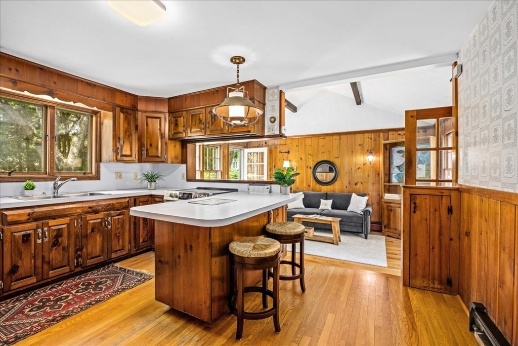 30 Cross Street Shrewsbury, MA 01545 - Photo 8 of 41 a view of a kitchen with a sink and a stove top oven
