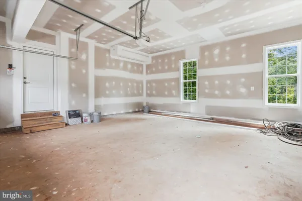 a bathroom with a tub sink and a shower