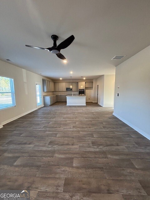 346 Jarrett Street, Unit 56 Fairburn, GA 30213 - Photo 21 of 25 a view of an empty room and window