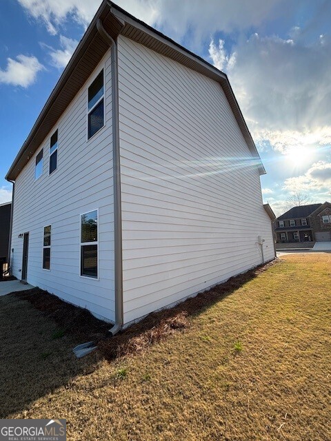 346 Jarrett Street, Unit 56 Fairburn, GA 30213 - Photo 24 of 25 a view of backyard of house
