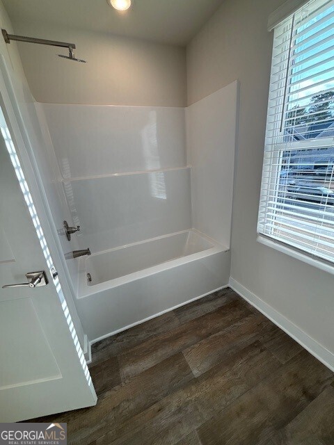 346 Jarrett Street, Unit 56 Fairburn, GA 30213 - Photo 9 of 25 a view of walk in closet with window