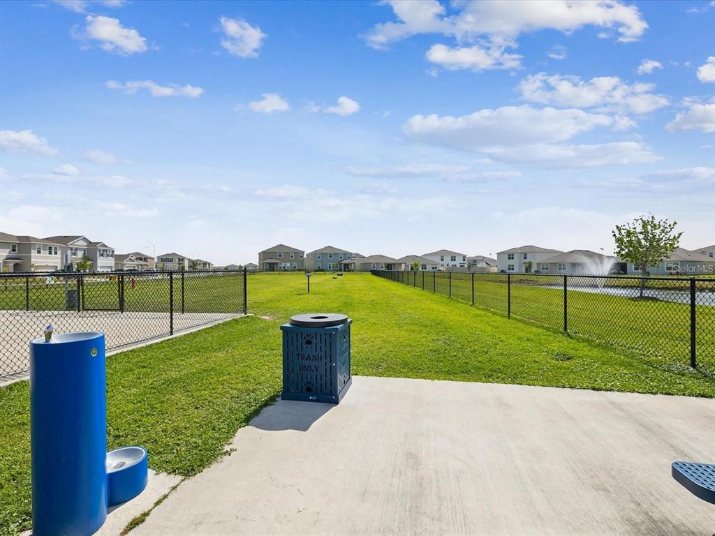 9176 Forge Breeze Loop Wesley Chapel, FL 33545 - Photo 33 of 33 a view of a park with large trees