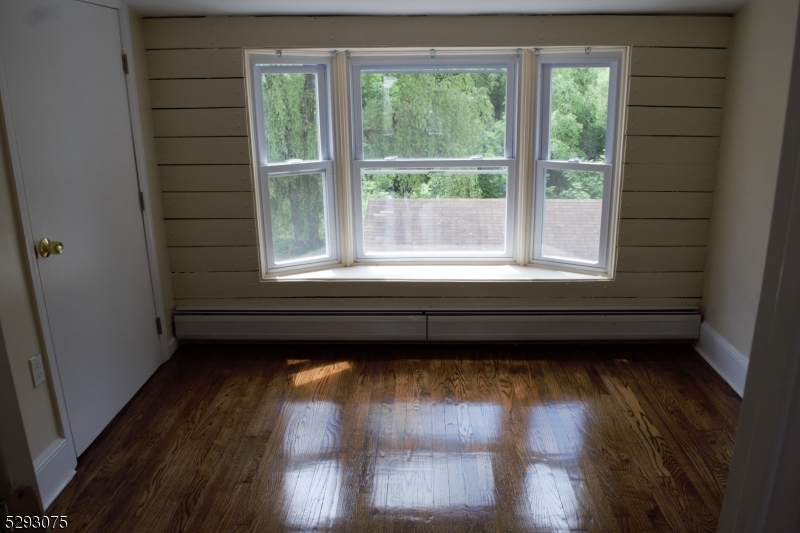 55 Highway 23, Unit 1 Hamburg, NJ 07419 - Photo 11 of 14 a view of a room with wooden floor and a window