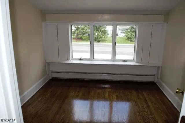 a view of a room that has a window in it