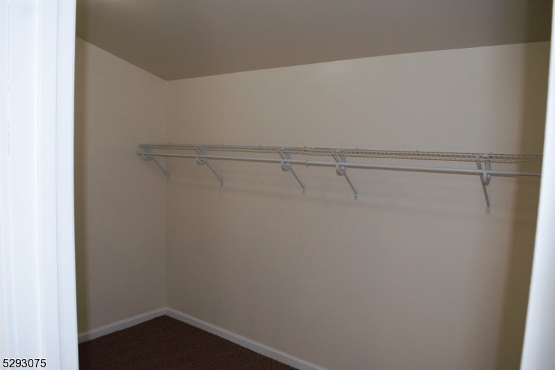 55 Highway 23, Unit 1 Hamburg, NJ 07419 - Photo 14 of 14 a view of a room with racks on the wall