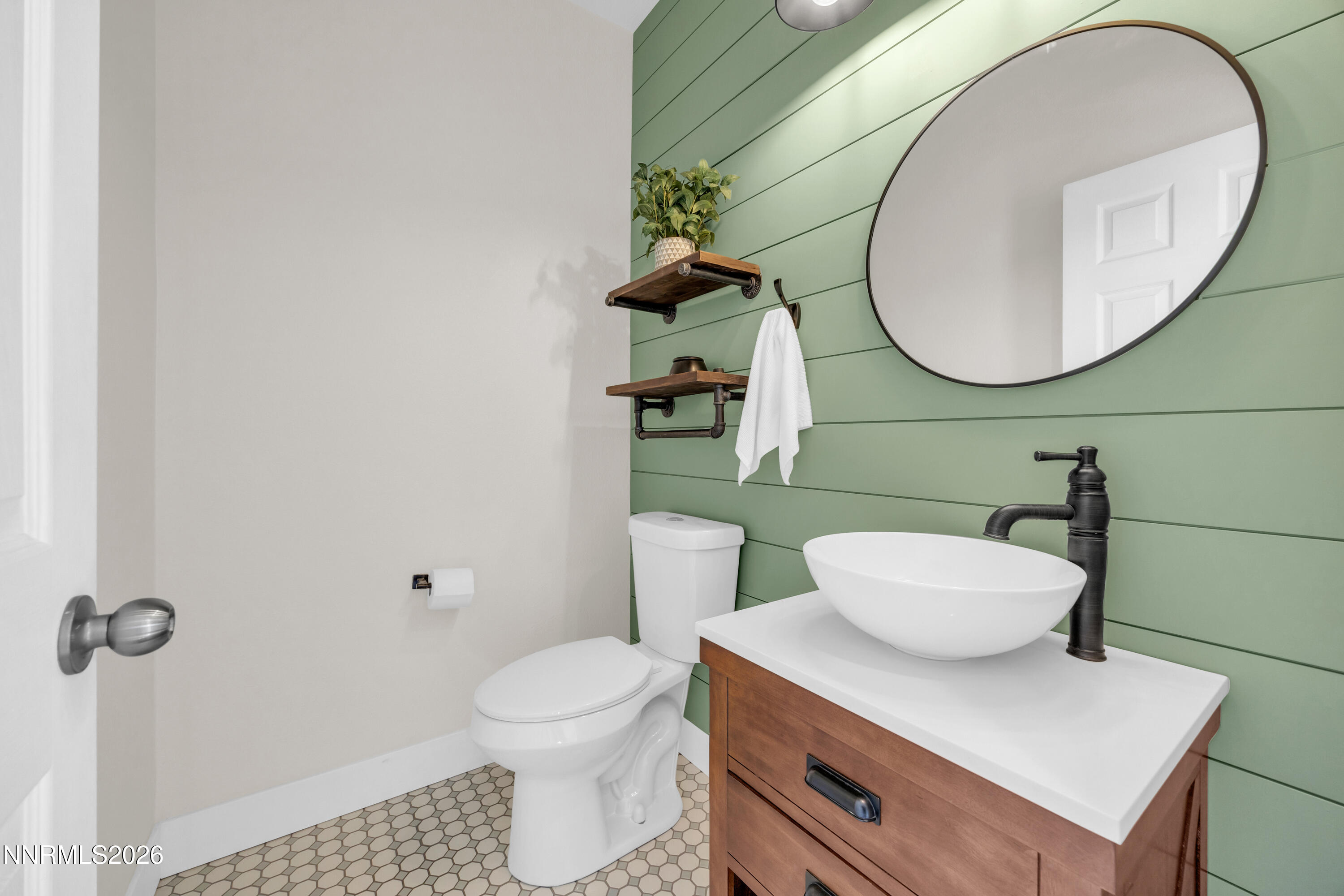 2085 Black Sand Drive Reno, NV 89521 - Photo 13 of 37 a bathroom with a sink mirror and toilet