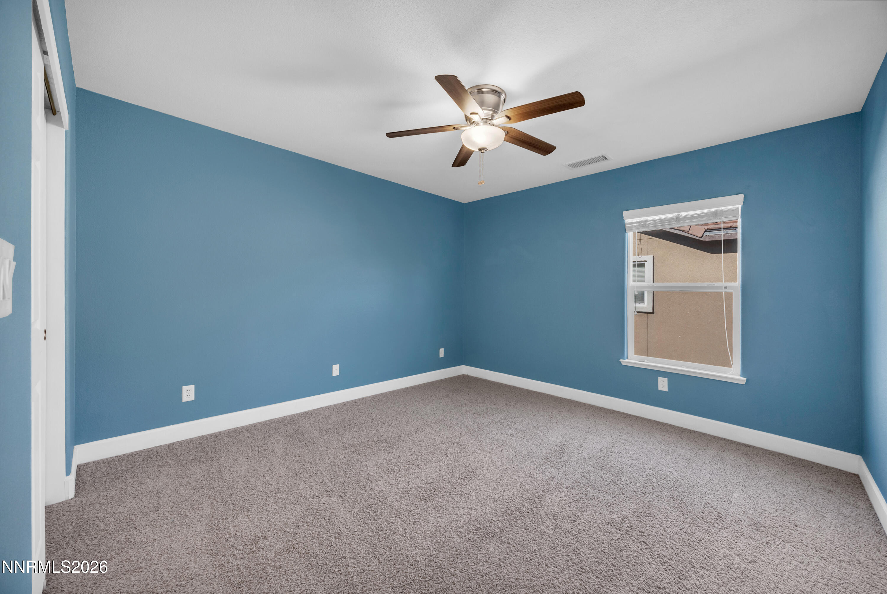 2085 Black Sand Drive Reno, NV 89521 - Photo 20 of 37 a view of an empty room with window