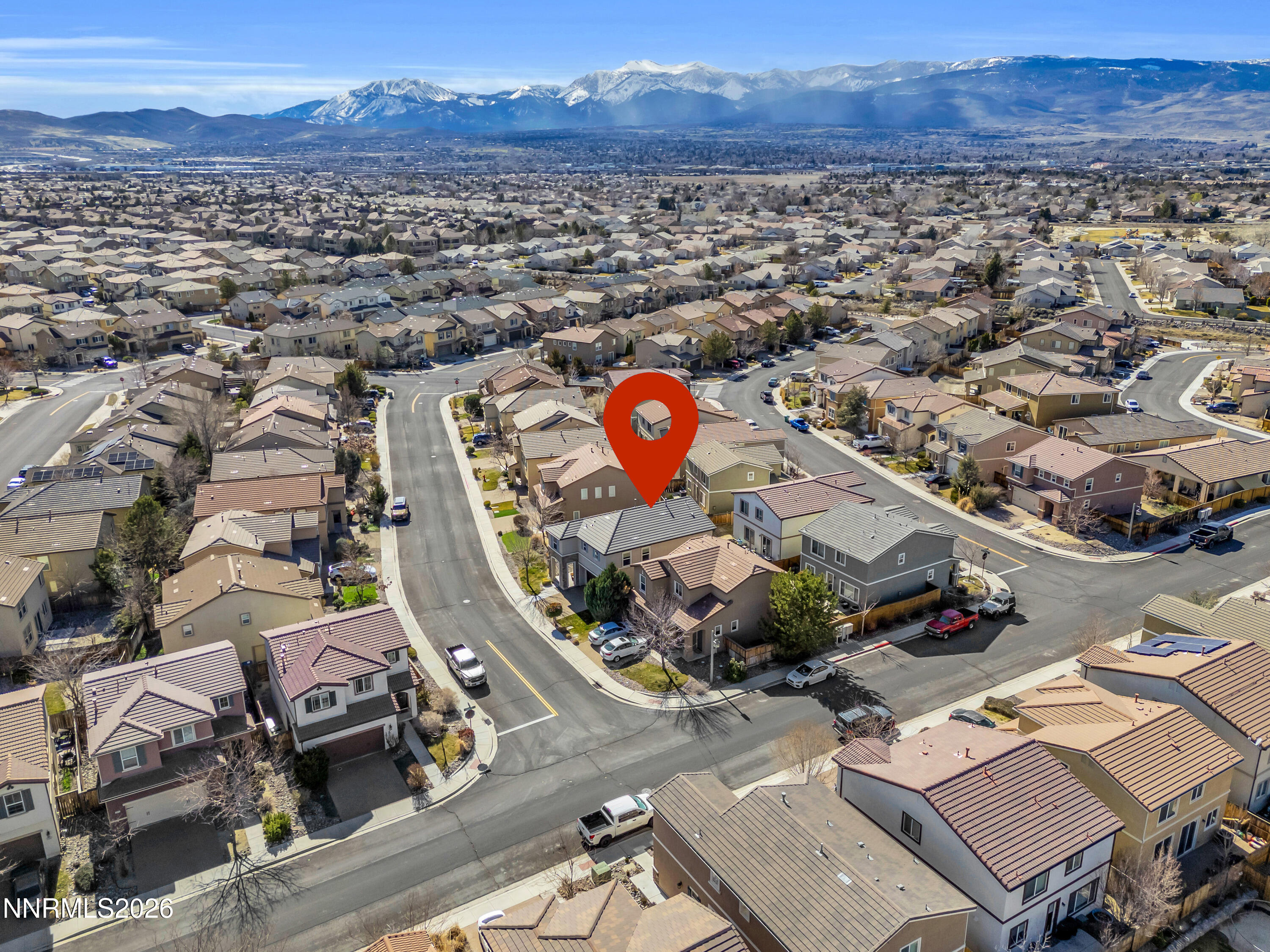 2085 Black Sand Drive Reno, NV 89521 - Photo 2 of 37 an aerial view of a swimming pool and mountain view