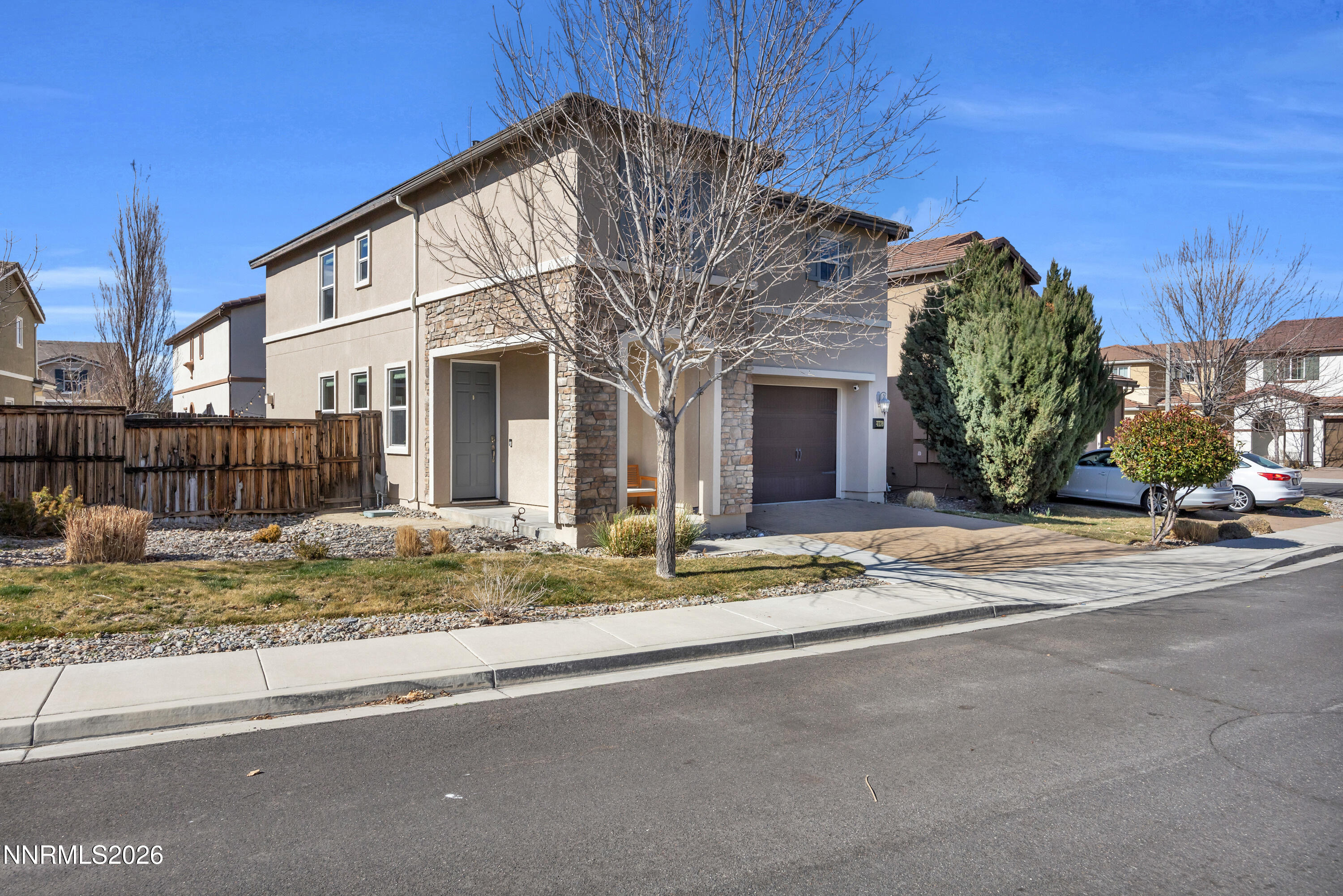 2085 Black Sand Drive Reno, NV 89521 - Photo 36 of 37 a view of a house with a yard and garage